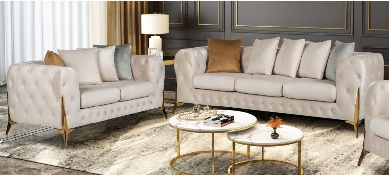 Matrix plush velvet cream colour. Tufted sofa with golden chrome legs.