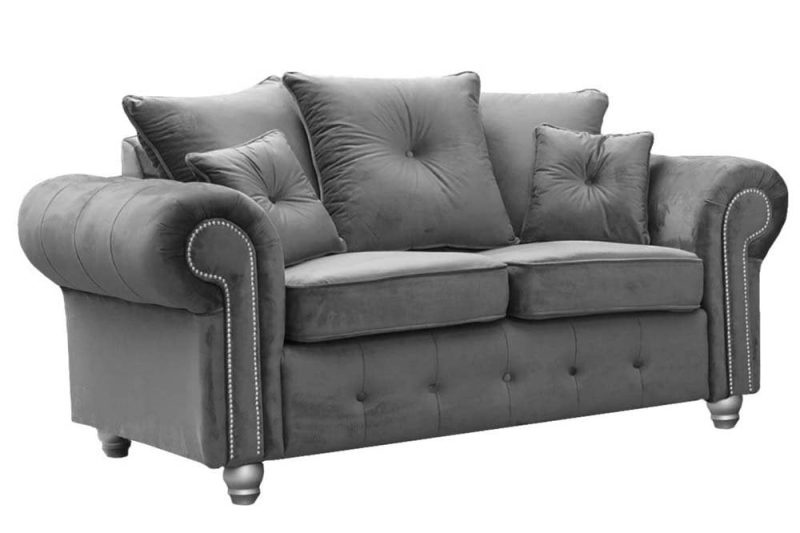 Olympia 2 seater sofa. Buttoned arms, scatter cushions and 4 legs.